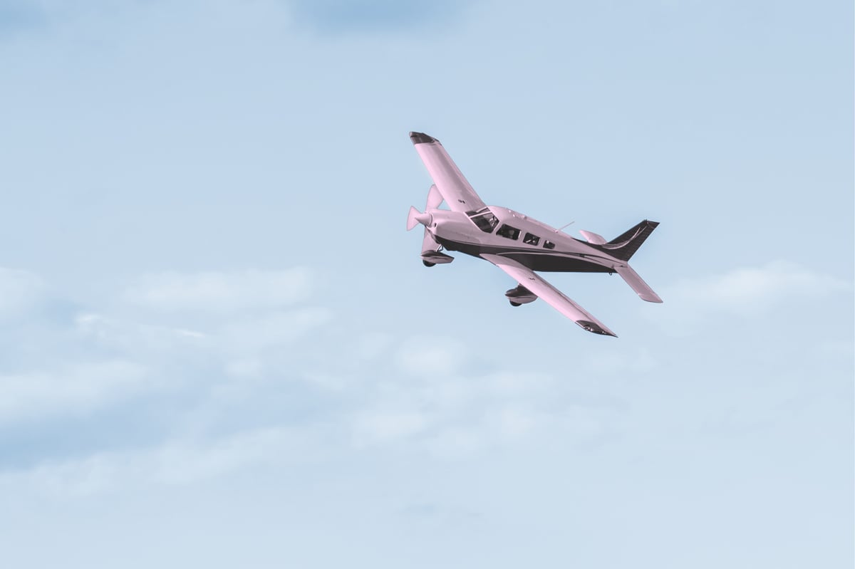 Single-engine airplane circling to land